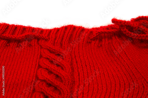texture of red knitting fabric with a scythe