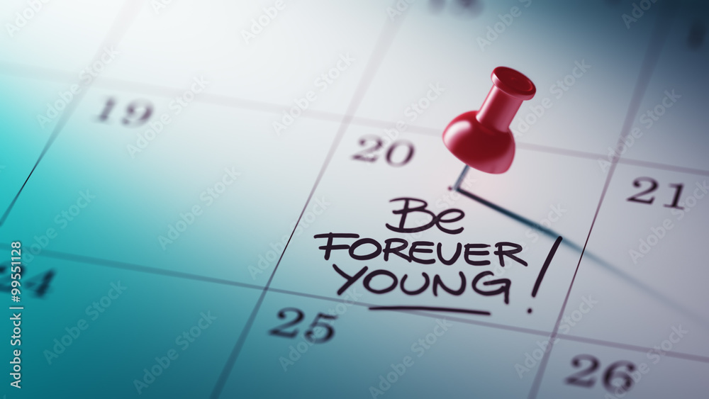 Concept image of a Calendar with a red push pin. Closeup shot of Concept image of a Calendar with a red push pin. Closeup shot of