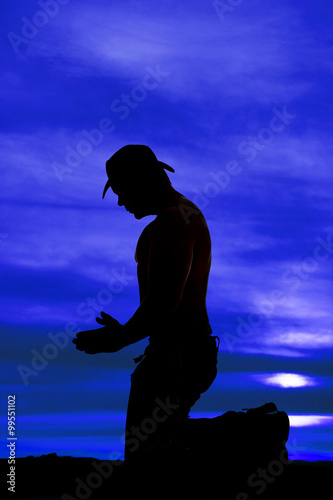 silhouette cowboy no shirt kneel pray