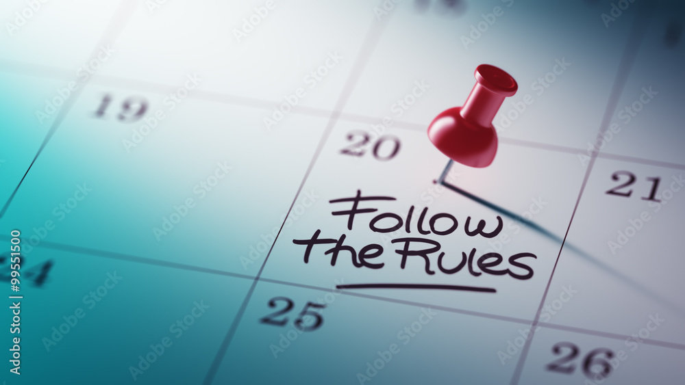Concept image of a Calendar with a red push pin. Closeup shot of Concept image of a Calendar with a red push pin. Closeup shot of