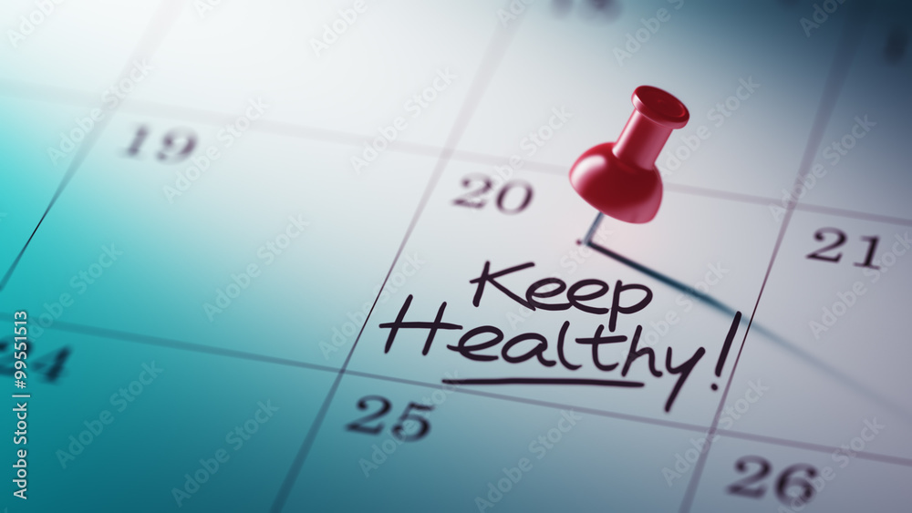 Concept image of a Calendar with a red push pin. Closeup shot of Concept image of a Calendar with a red push pin. Closeup shot of