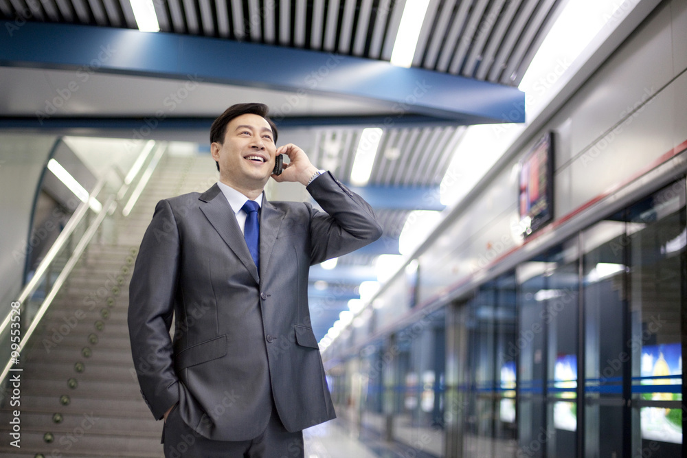Commuter on the phone Commuter on the phone