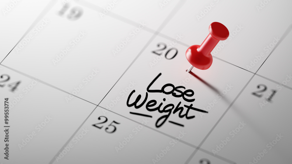 Concept image of a Calendar with a red push pin. Closeup shot of Concept image of a Calendar with a red push pin. Closeup shot of