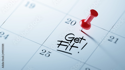 Concept image of a Calendar with a red push pin. Closeup shot of