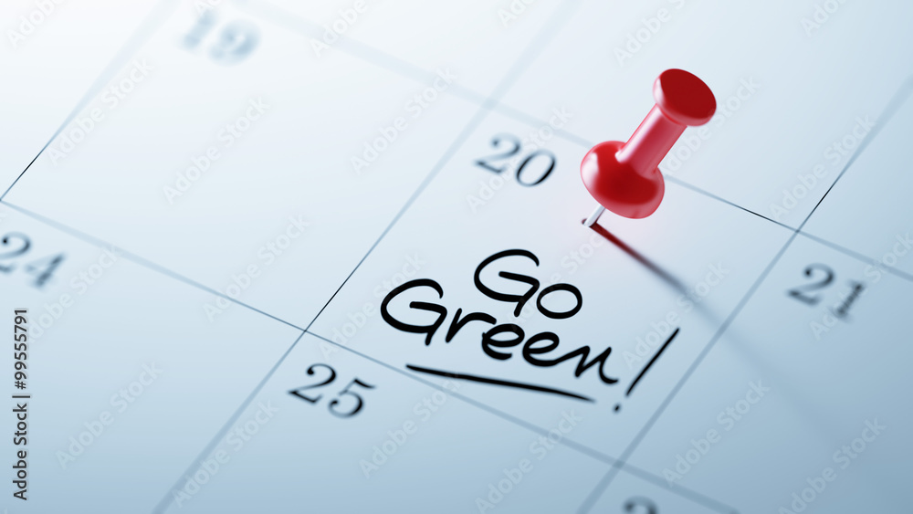 Concept image of a Calendar with a red push pin. Closeup shot of