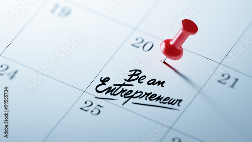 Concept image of a Calendar with a red push pin. Closeup shot of