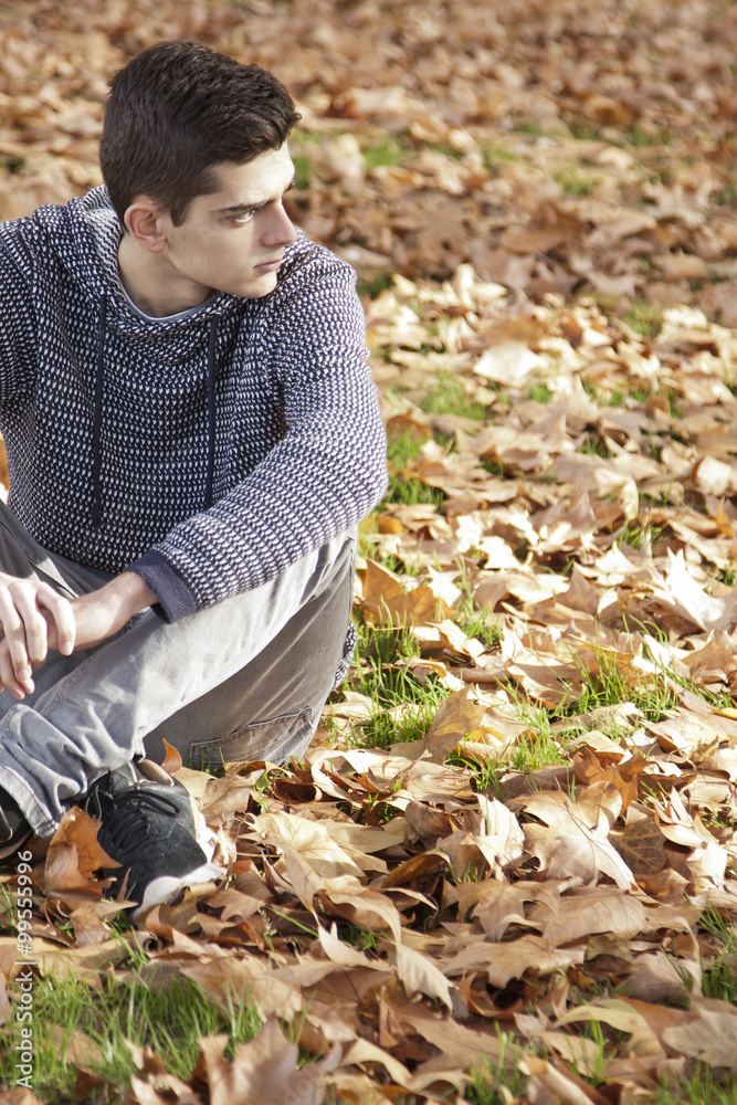 young teenage boy in the park outdoors young teenage boy in the park outdoors
