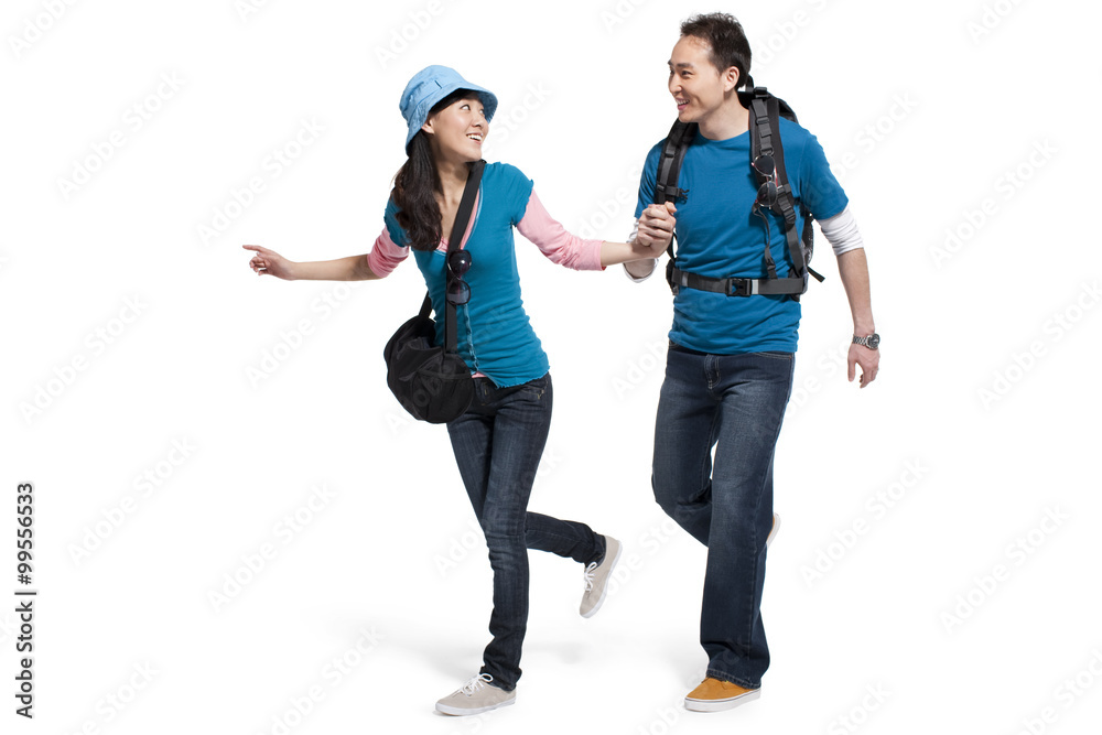Fototapeta premium Portrait of young couple travelling