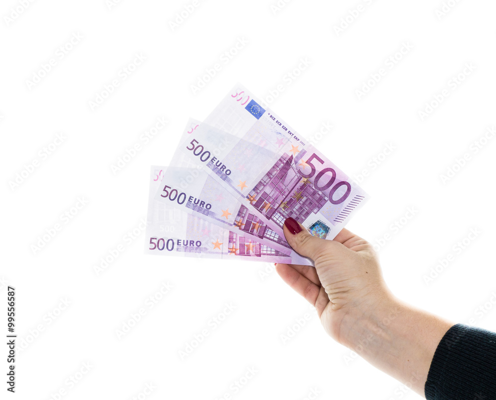 hand holding 500 euro money isolated on white background hand holding 500 euro money isolated on white background