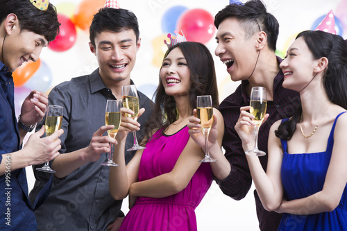 Young adults toasting in party
