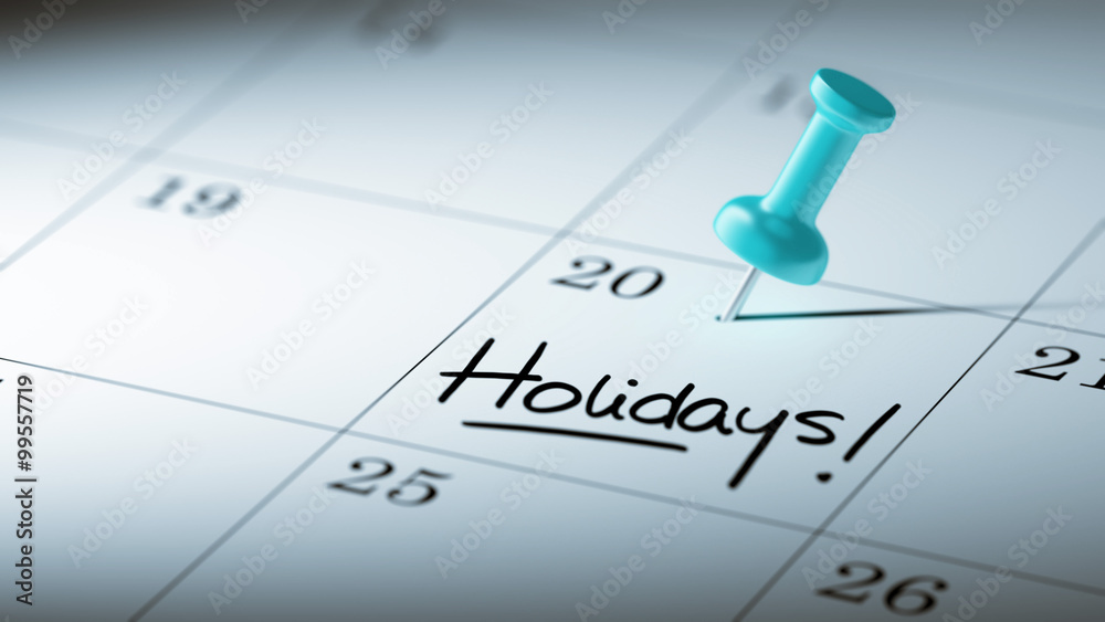 Concept image of a Calendar with a blue push pin. Closeup shot o Concept image of a Calendar with a blue push pin. Closeup shot o