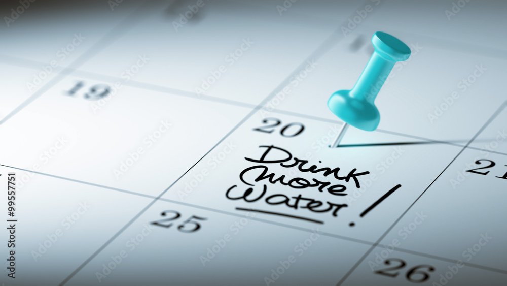 Concept image of a Calendar with a blue push pin. Closeup shot o Concept image of a Calendar with a blue push pin. Closeup shot o