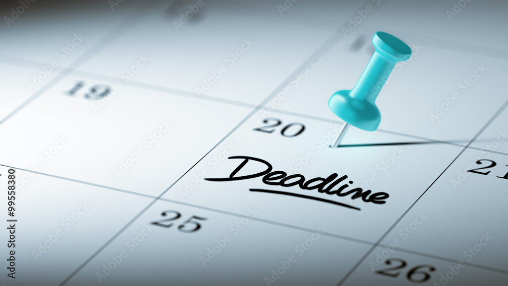 Concept image of a Calendar with a blue push pin. Closeup shot o Concept image of a Calendar with a blue push pin. Closeup shot o