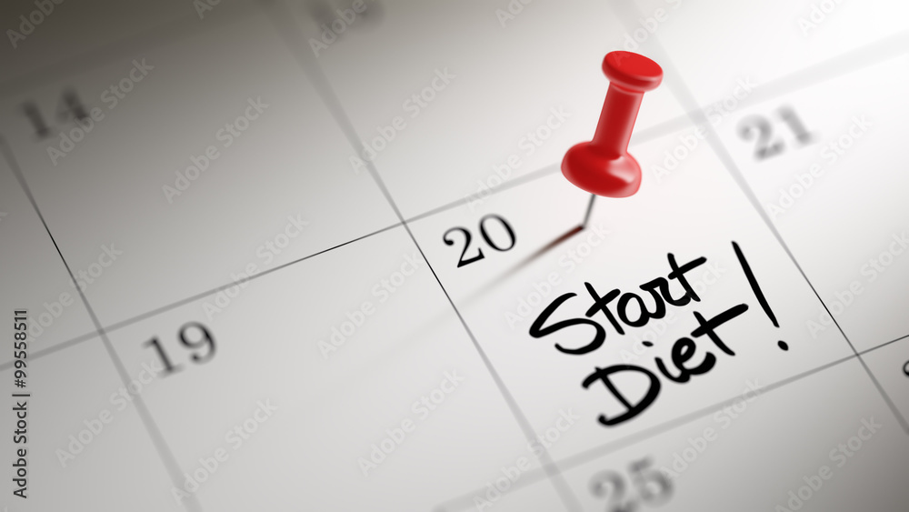 Concept image of a Calendar with a red push pin. Closeup shot of Concept image of a Calendar with a red push pin. Closeup shot of