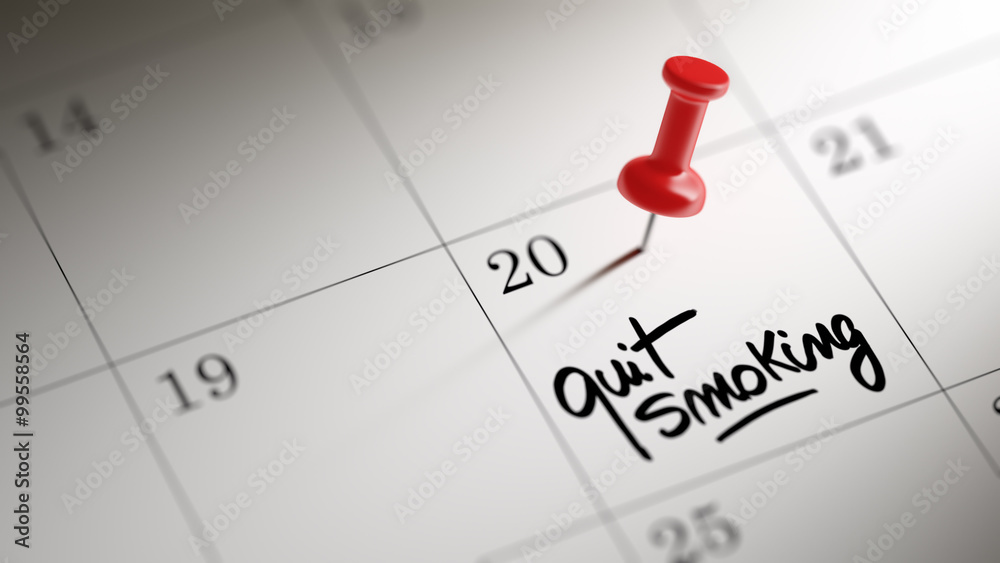 Concept image of a Calendar with a red push pin. Closeup shot of Concept image of a Calendar with a red push pin. Closeup shot of