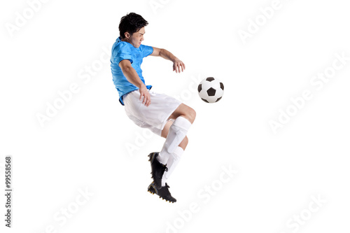 Soccer player jumping © Blue Jean Images