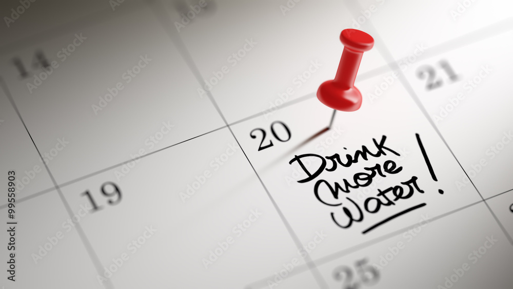 Concept image of a Calendar with a red push pin. Closeup shot of Concept image of a Calendar with a red push pin. Closeup shot of