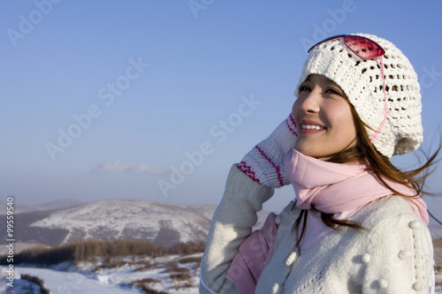 Young woman smiling into the distance