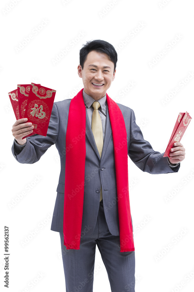 Happy business colleagues gifting traditional red envelopes Happy business colleagues gifting traditional red envelopes