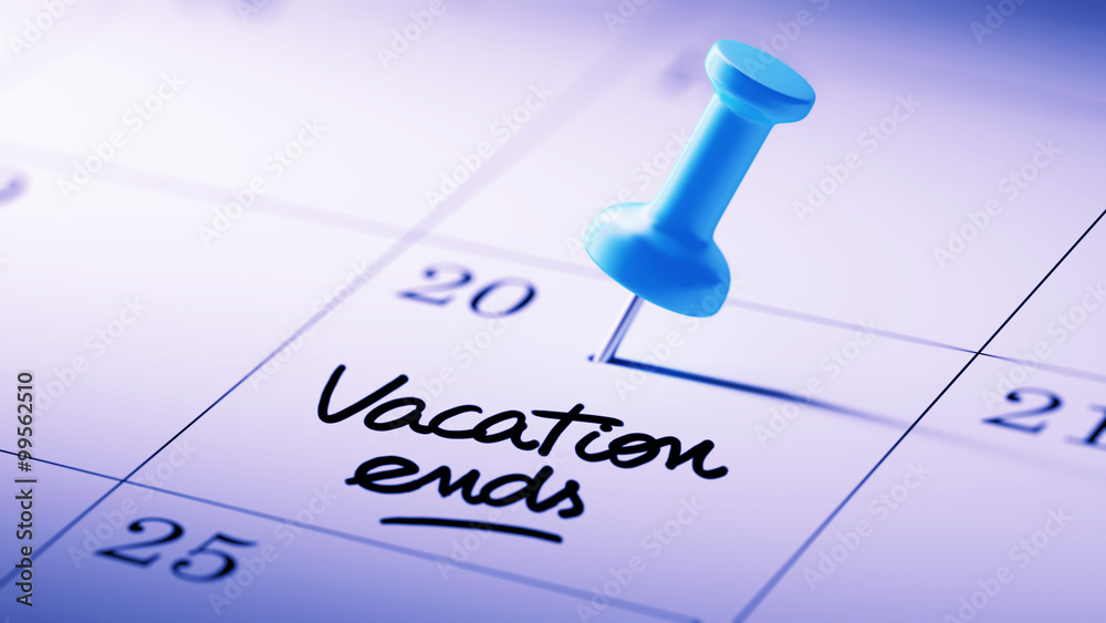 Concept image of a Calendar with a blue push pin. Closeup shot o Concept image of a Calendar with a blue push pin. Closeup shot o