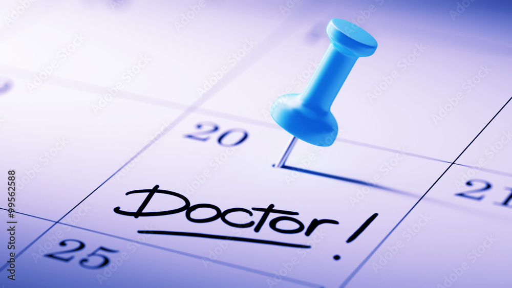 Concept image of a Calendar with a blue push pin. Closeup shot o Concept image of a Calendar with a blue push pin. Closeup shot o
