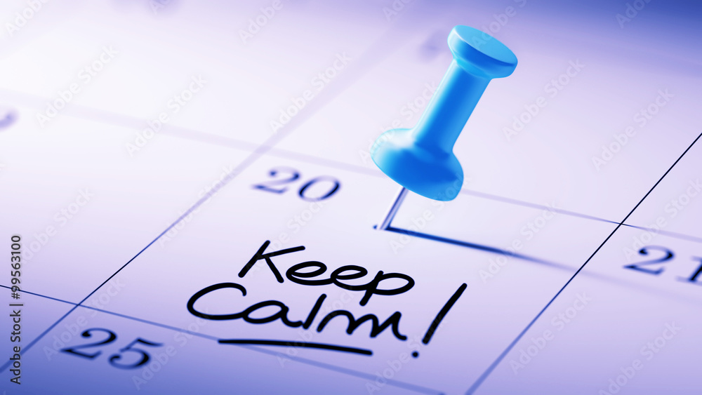 Concept image of a Calendar with a blue push pin. Closeup shot o Concept image of a Calendar with a blue push pin. Closeup shot o