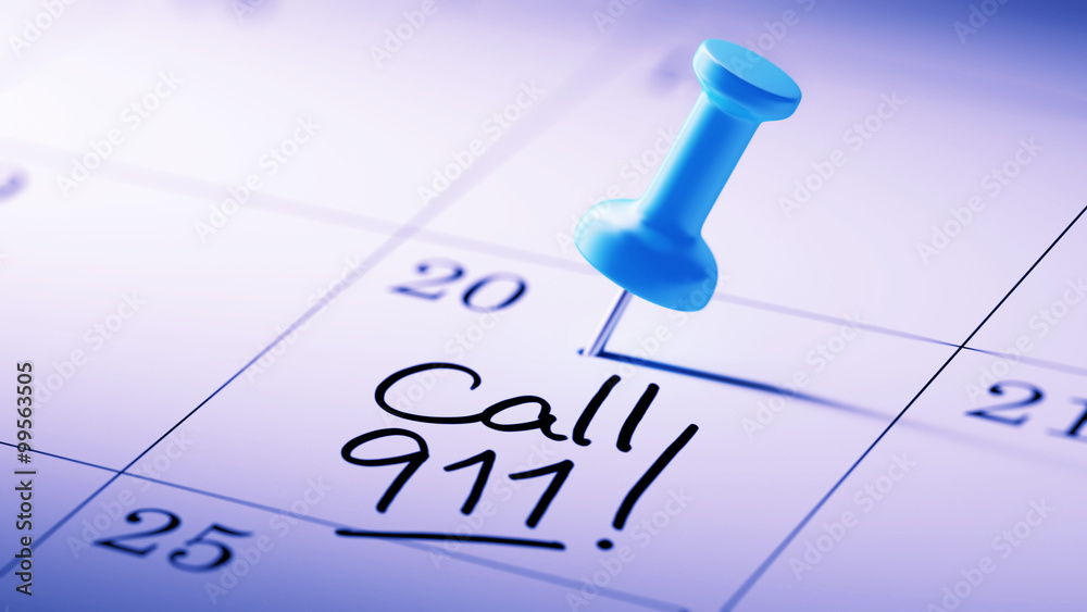 Concept image of a Calendar with a blue push pin. Closeup shot o Concept image of a Calendar with a blue push pin. Closeup shot o
