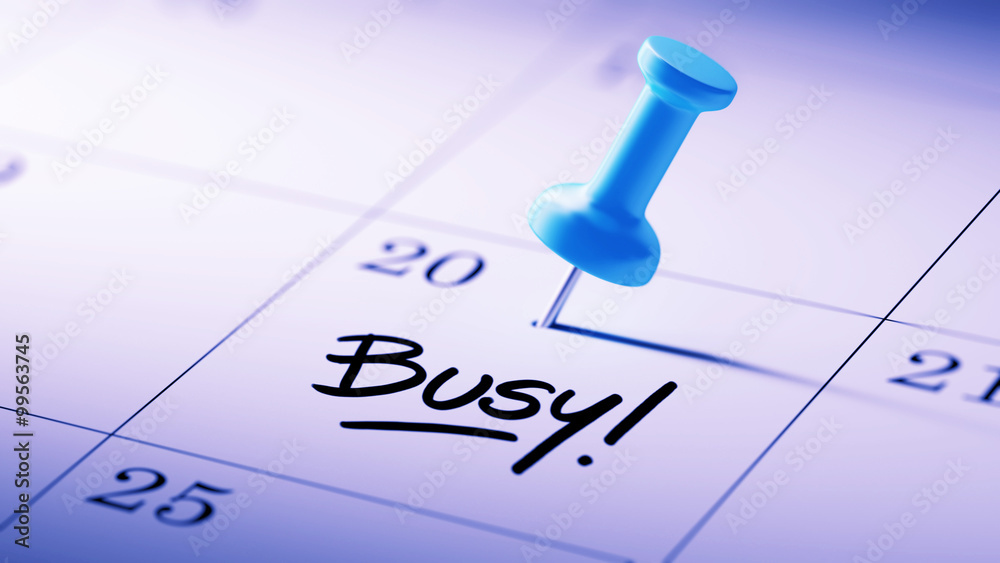 Concept image of a Calendar with a blue push pin. Closeup shot o Concept image of a Calendar with a blue push pin. Closeup shot o