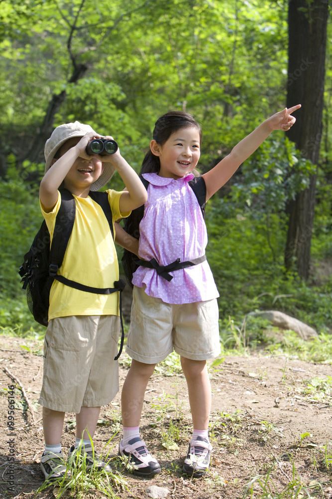 Fototapeta premium Brother and sister bird watching