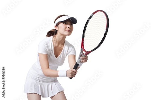 Young woman ready to play tennis © Blue Jean Images