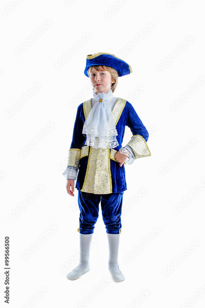 young boy in medieval carnival costume, blue caftan, white bow, cocked hat, tricorn young boy in medieval carnival costume, blue caftan, white bow, cocked hat, tricorn
