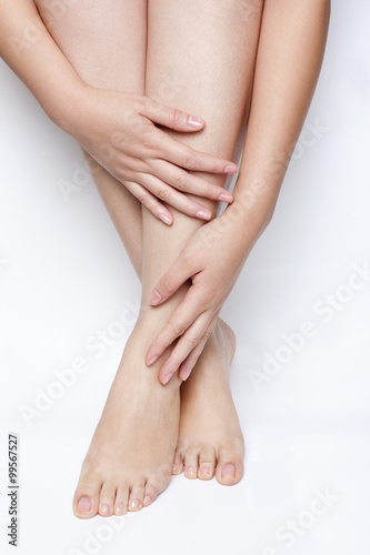 Woman Touching Her Leg