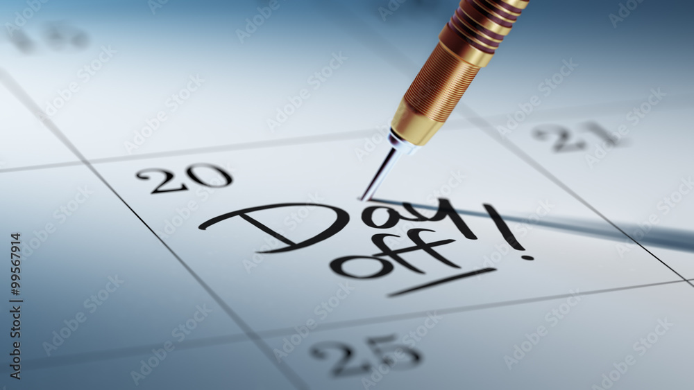 Concept image of a Calendar with a golden dart stick.. The words Concept image of a Calendar with a golden dart stick.. The words