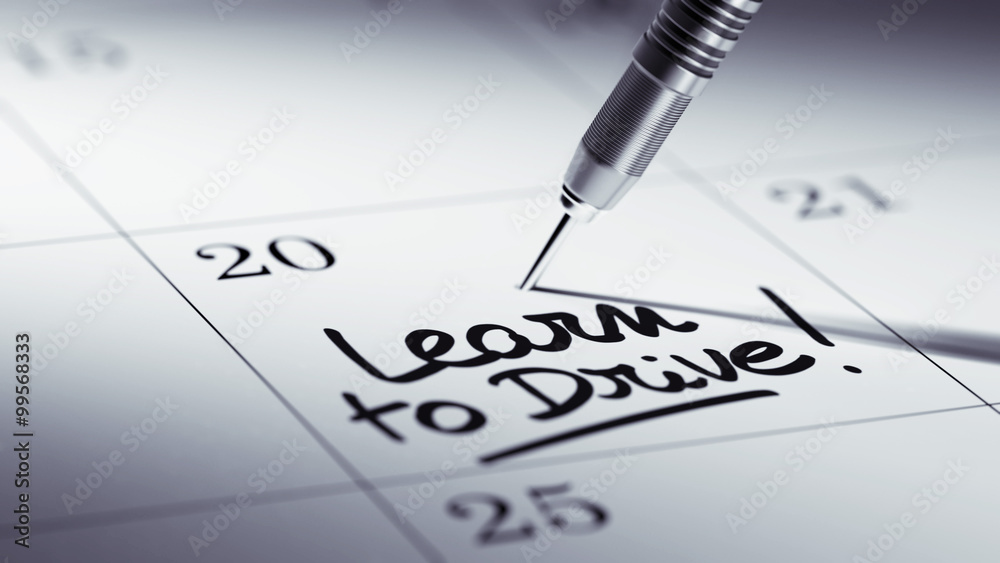 Concept image of a Calendar with a golden dart stick.. The words Concept image of a Calendar with a golden dart stick.. The words