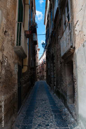 Narrow street between italian houses in old town of Tropea © attiarndt