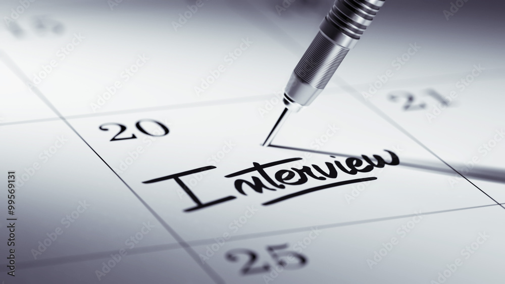 Concept image of a Calendar with a golden dart stick.. The words Concept image of a Calendar with a golden dart stick.. The words