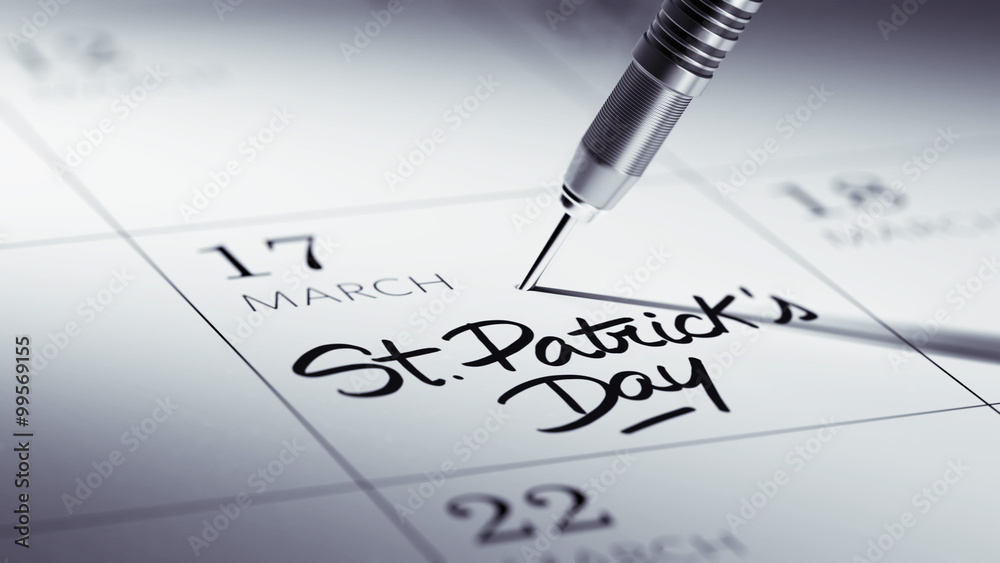 Concept image of a Calendar with a golden dart stick.. The words Concept image of a Calendar with a golden dart stick.. The words