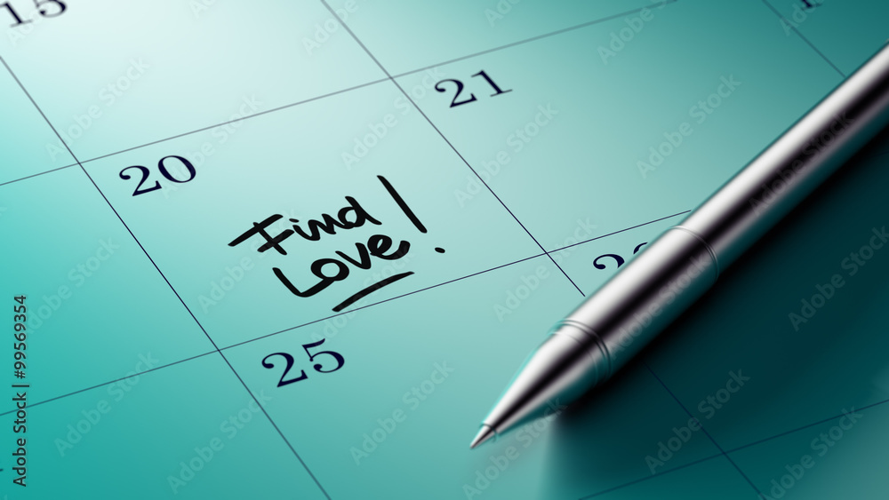 Closeup of a personal agenda setting an important date written w Closeup of a personal agenda setting an important date written w