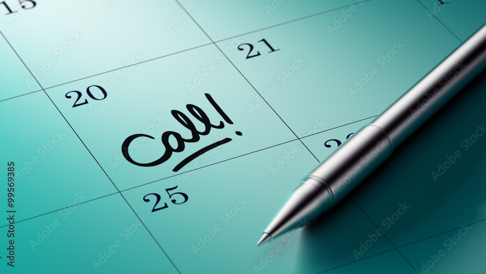 Closeup of a personal agenda setting an important date written w Closeup of a personal agenda setting an important date written w