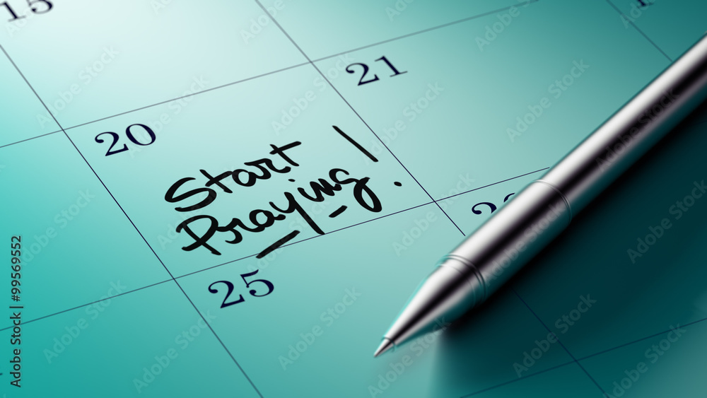 Closeup of a personal agenda setting an important date written w Closeup of a personal agenda setting an important date written w