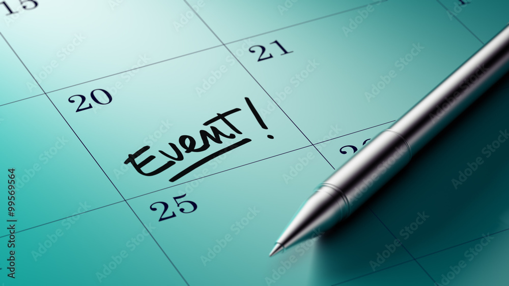 Closeup of a personal agenda setting an important date written w Closeup of a personal agenda setting an important date written w