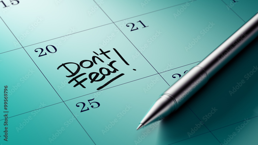 Closeup of a personal agenda setting an important date written w Closeup of a personal agenda setting an important date written w