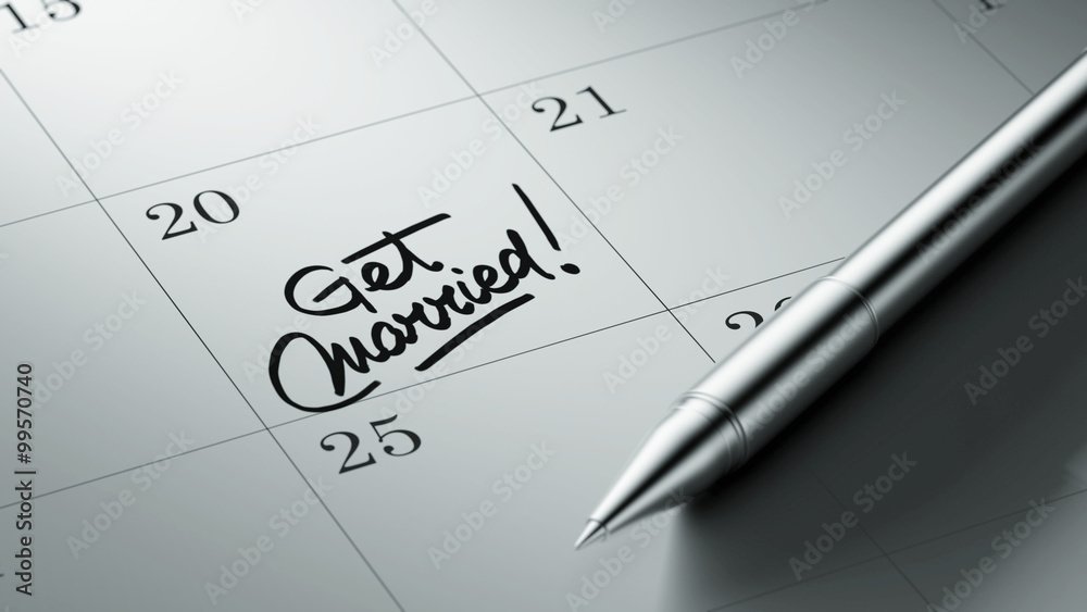 Closeup of a personal agenda setting an important date written w