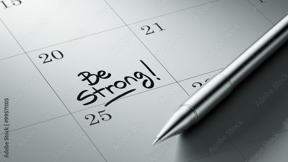 Closeup of a personal agenda setting an important date written w