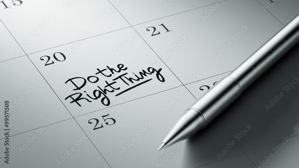 Closeup of a personal agenda setting an important date written w Closeup of a personal agenda setting an important date written w