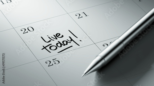 Billede på lærred Closeup of a personal agenda setting an important date written w