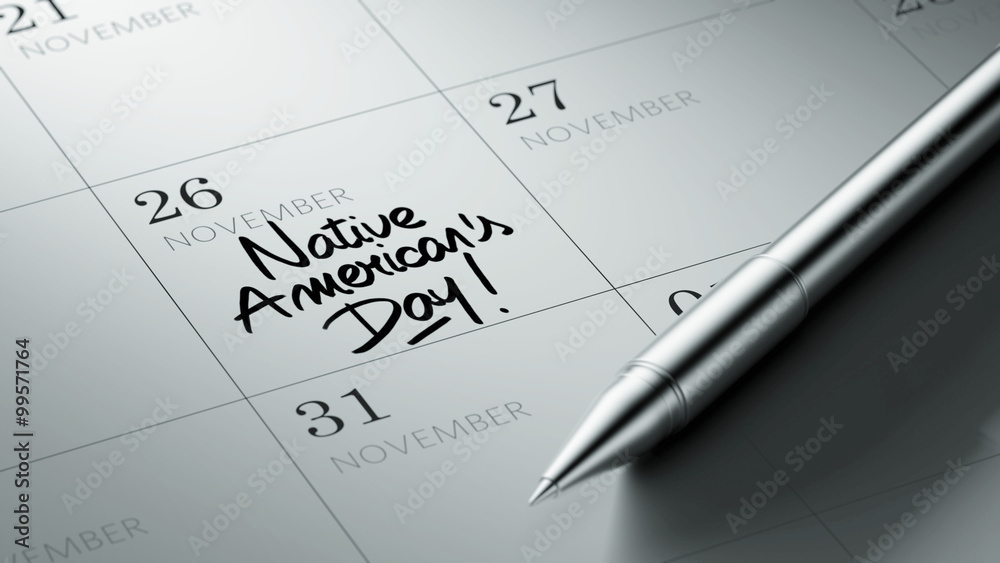 Closeup of a personal agenda setting an important date written w Closeup of a personal agenda setting an important date written w