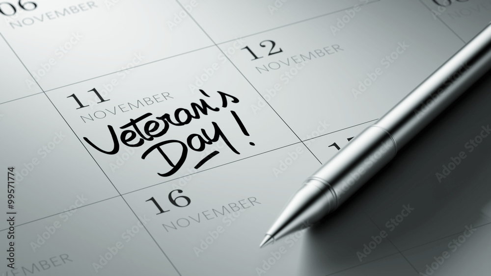 Closeup of a personal agenda setting an important date written w Closeup of a personal agenda setting an important date written w