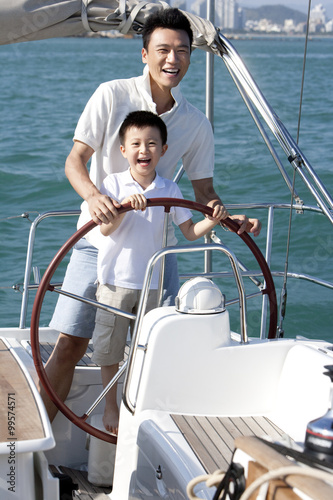 Father and son sailing
