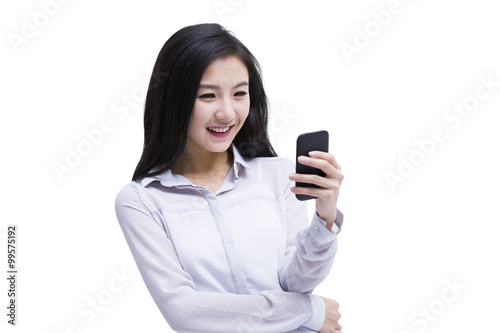 Cheerful young woman text messaging